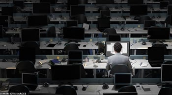 worker-alone-dark-office.jpg